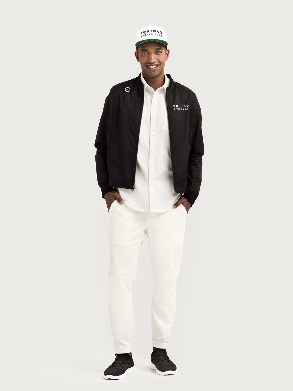 black sports club nylon jacket uniform for equinox by finery.