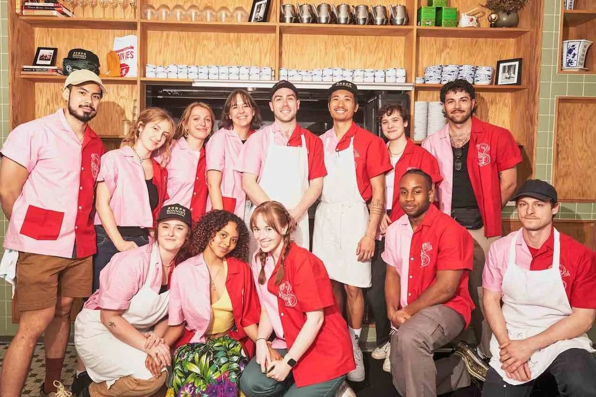 Group of people wearing Bonnie's custom two color shirt uniform by Finery.