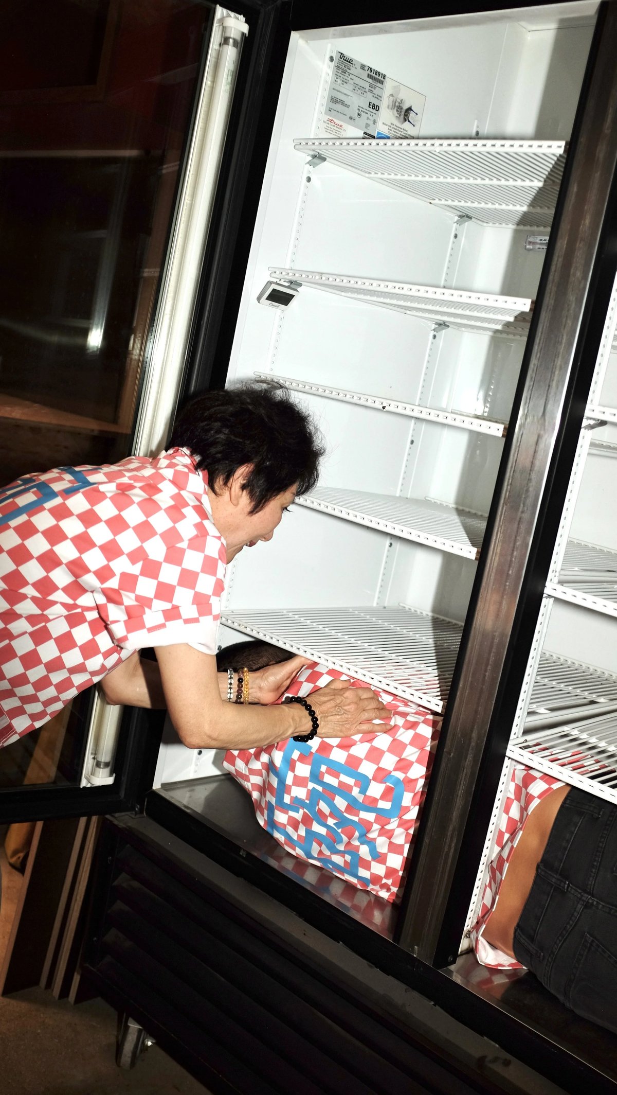 Man in fridge wearing Woon work shirt collaboration designed by Finery.