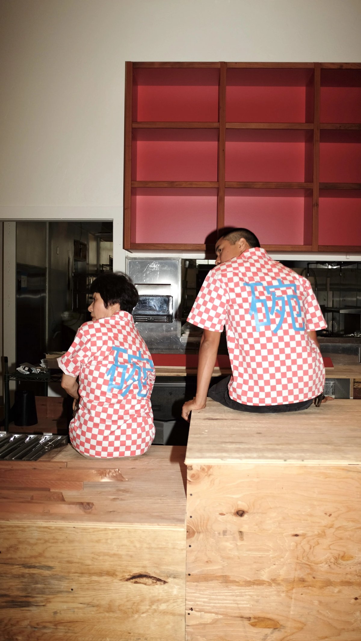 Back of checkered Woon work shirt collaboration designed by Finery.